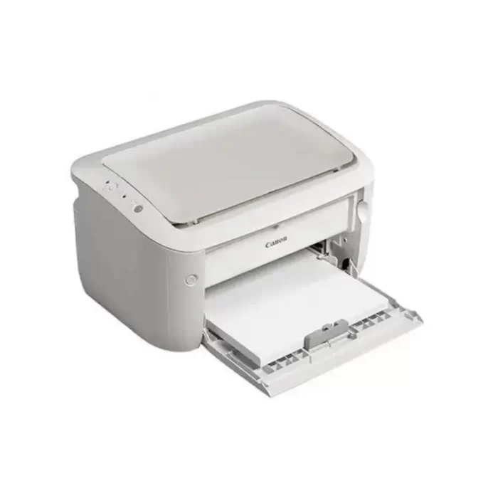 Canon LBP6030B printer placed on a desk in a small work environment