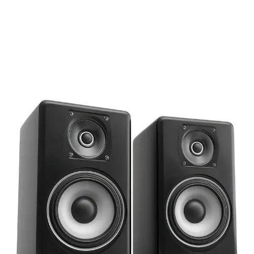 Portable audio devices including Bluetooth speakers, wireless earbuds, and noise-cancelling headphones displayed on a table