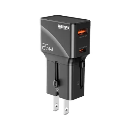 Remax CM03 Explorer 25W GaN Travel Charger plugged into a wall socket with a laptop and phone charging, showing its compact size.