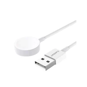 Charging a smartphone with a white magnetic wireless cable on a desk
