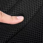 Lightweight Golden Wolf crossbody backpack in hand